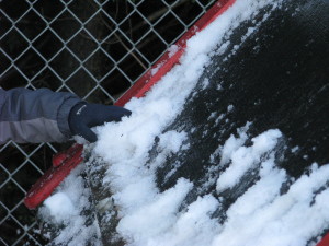 H continues to use his hands for snow removal.